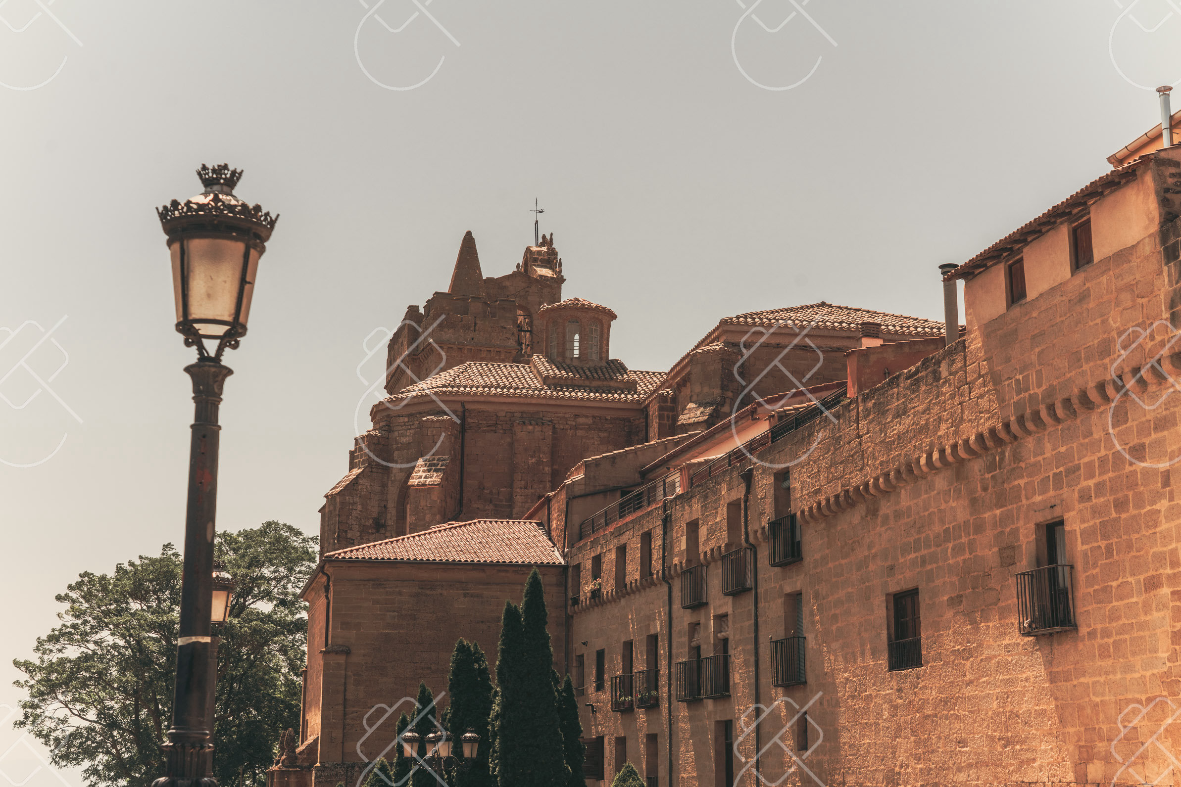 A church tower rising above Laguardia's medieval streets — Laguardia, fine art travel photography print available from Clever Tourists