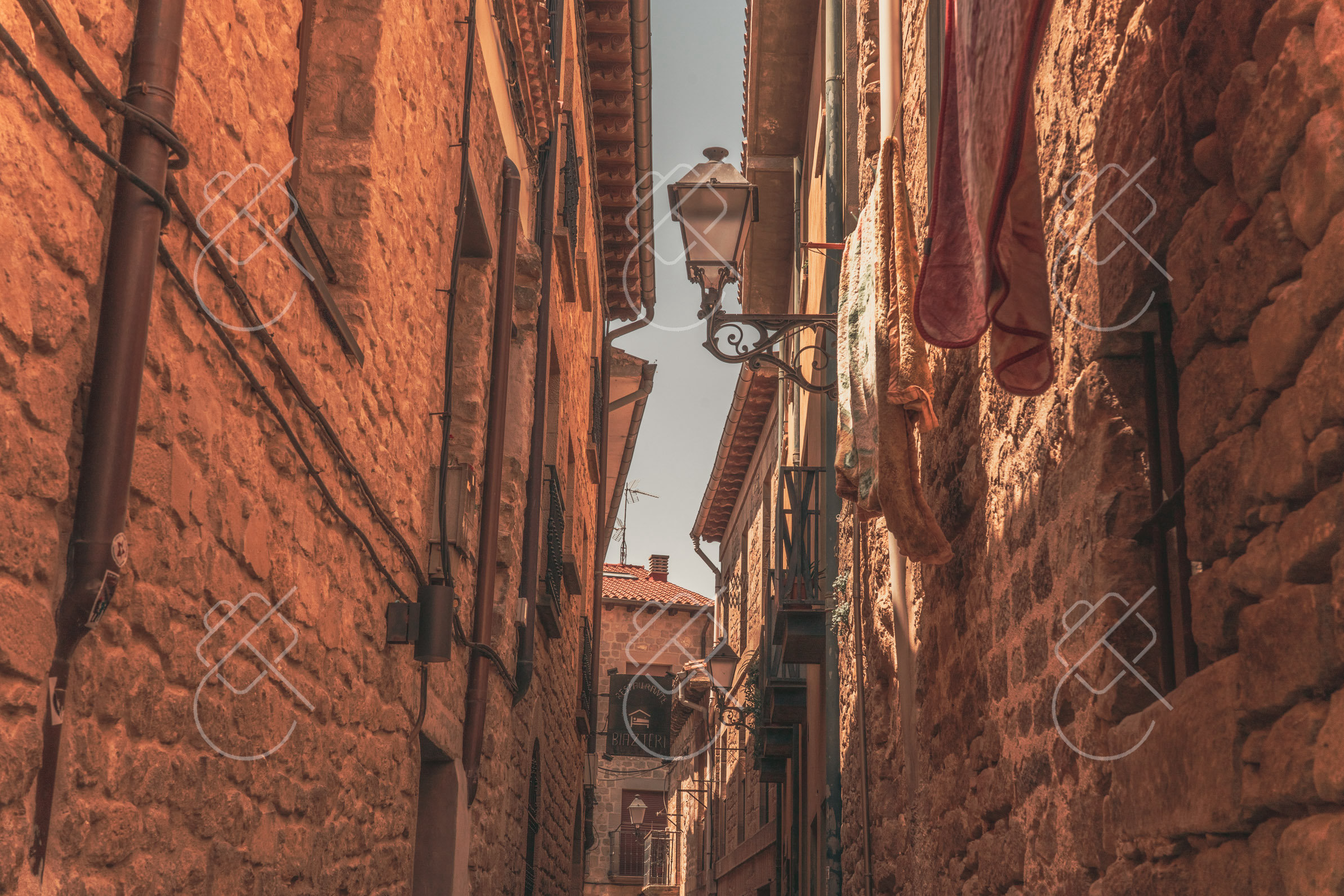 A narrow stone lane within Laguardia's old town walls — Laguardia, fine art travel photography print available from Clever Tourists