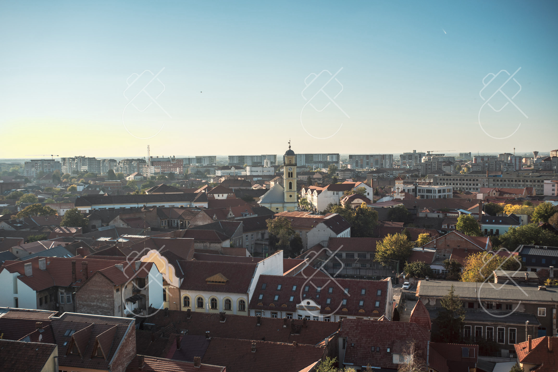 Rooftops and a church dome across Oradea's old town — Oradea, fine art travel photography print available from Clever Tourists
