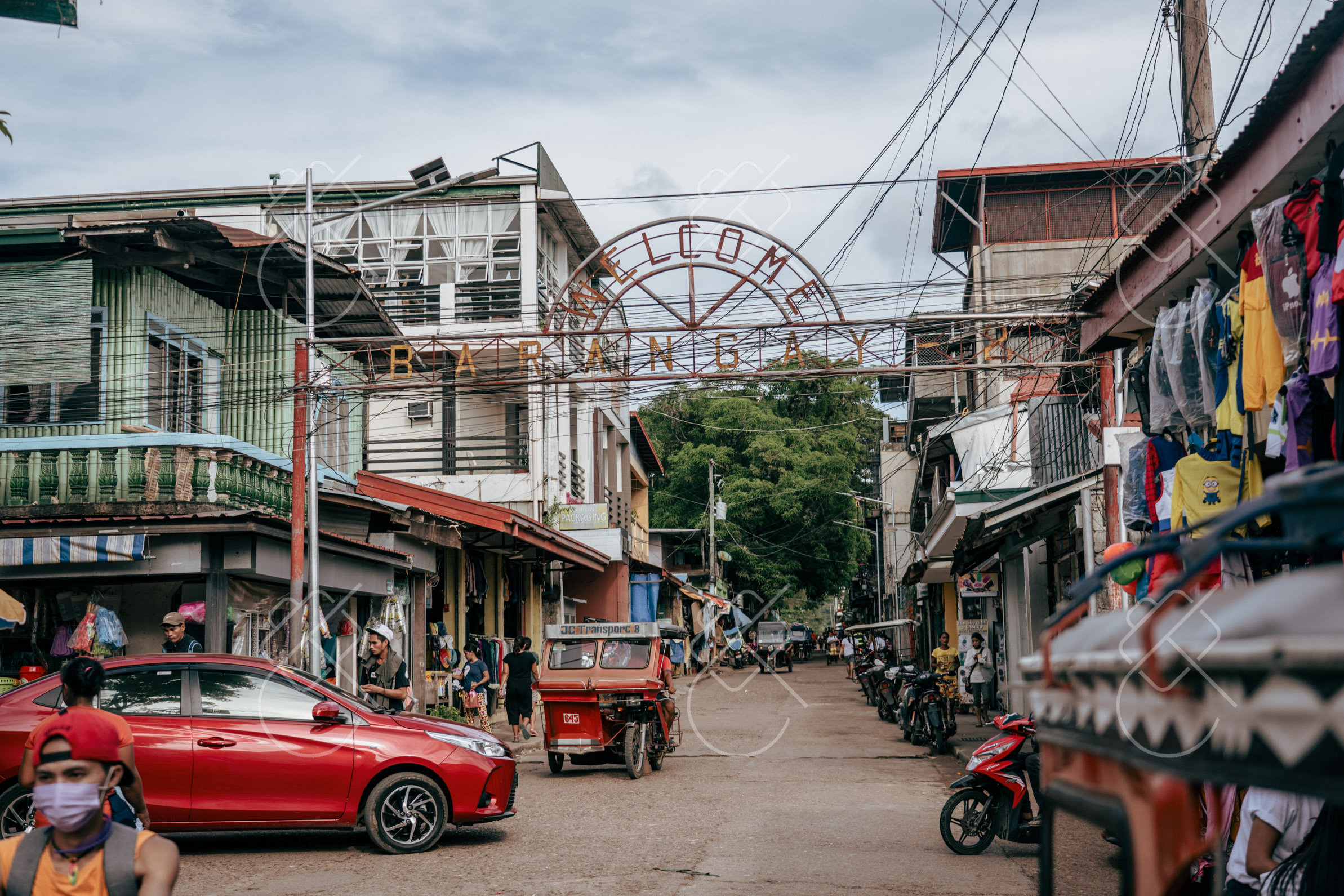 The hillside CORON sign above the town's main strip — Coron, fine art travel photography print available from Clever Tourists