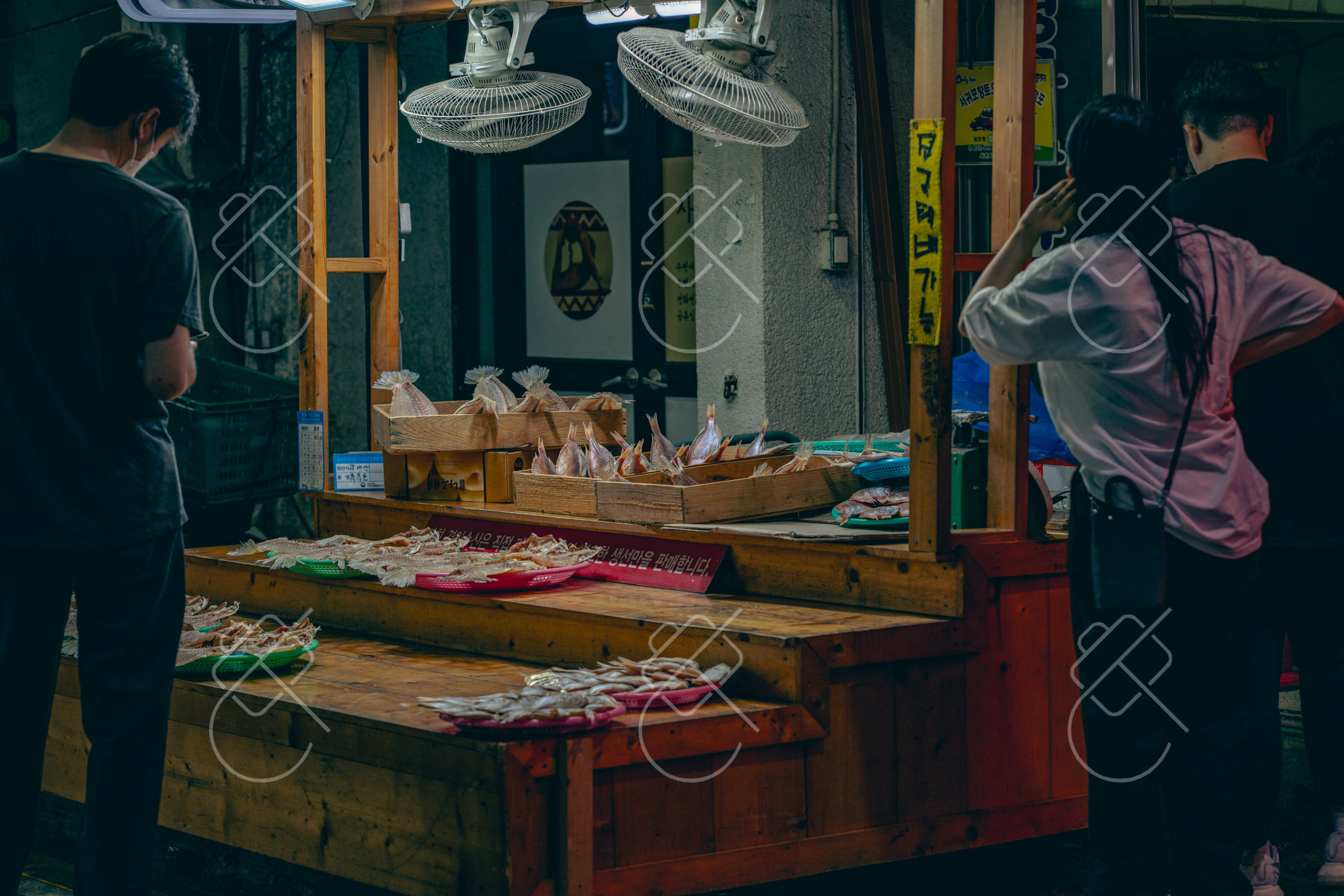 Fresh fish laid out at a stall in Seogwipo Maeil Olle Market — Seogwipo, fine art travel photography print available from Clever Tourists