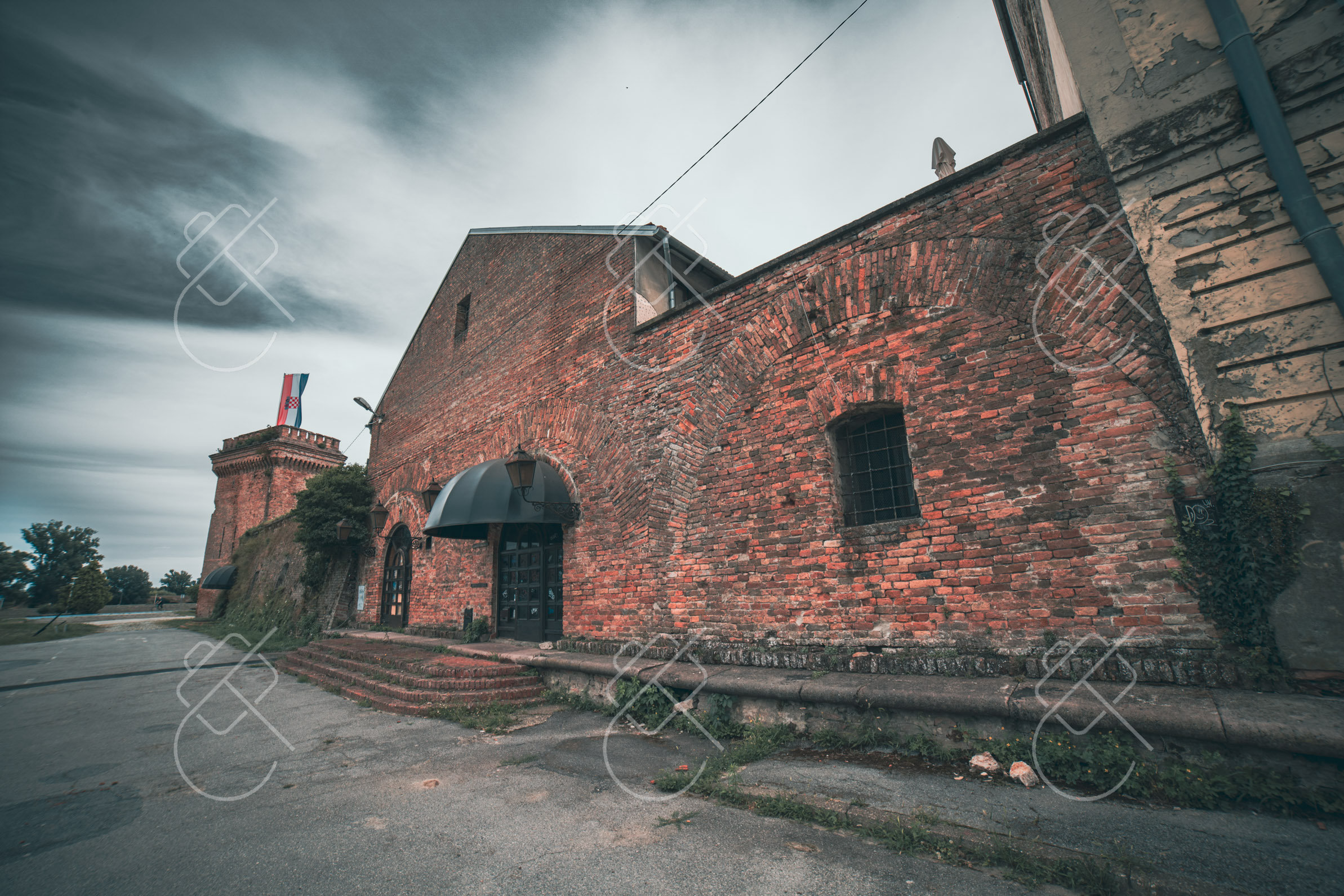 Weathered red brick along Tvrđa's old fortress walls — Osijek, fine art travel photography print available from Clever Tourists