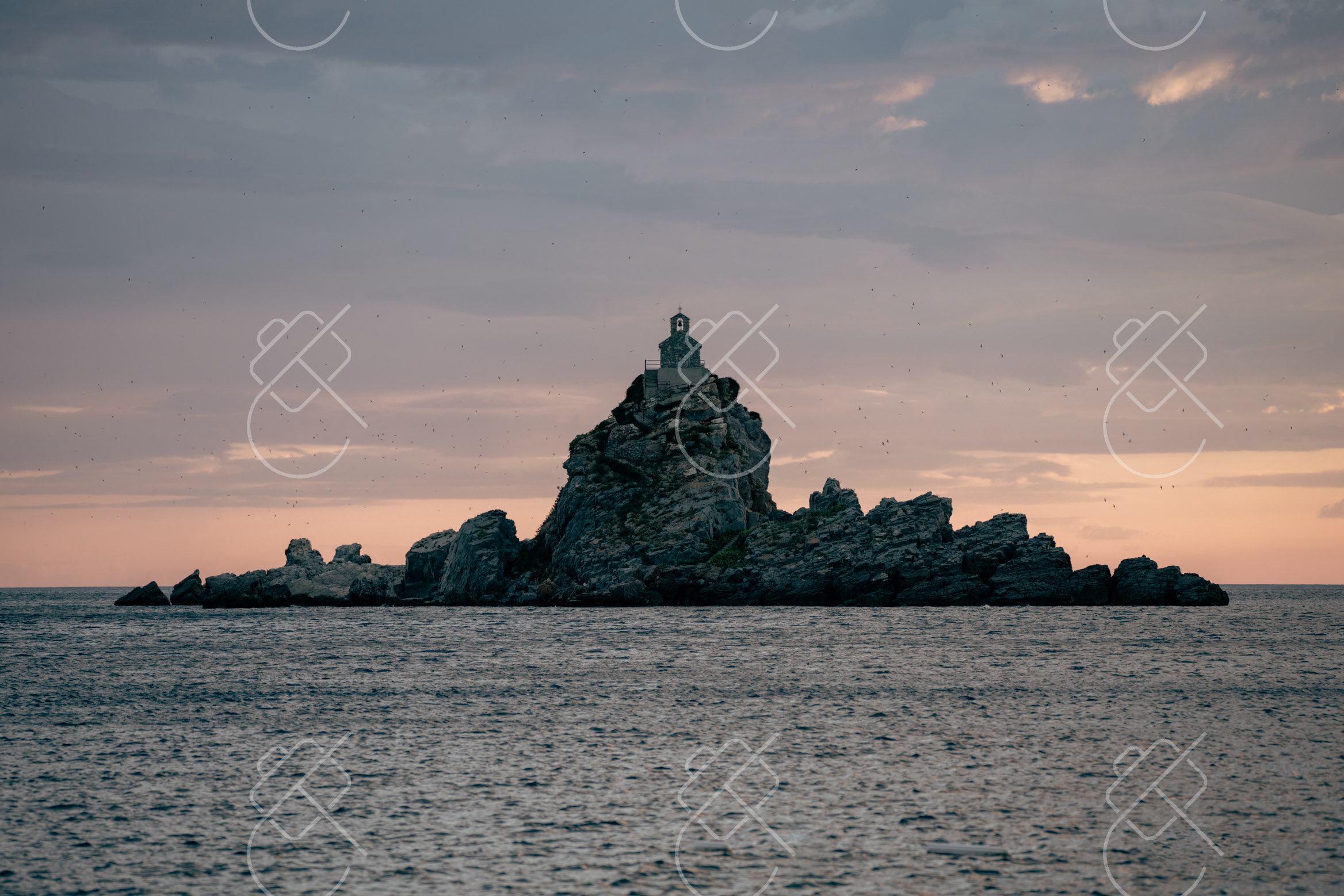 Sveta Neđelja islet and its small chapel silhouetted at dusk — Petrovac, fine art travel photography print available from Clever Tourists